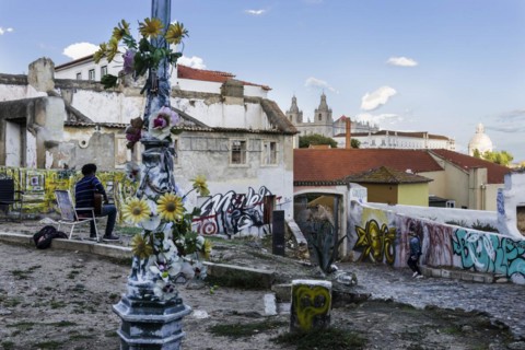 Musician overlooking Alfama, city view, tourism, travel, city trip, urban, building, historical,