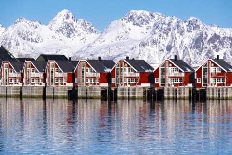 Lofoten, Norway. Solvaer, Nordland province. Holiday flats by the harbour basin, Svolvaer,
