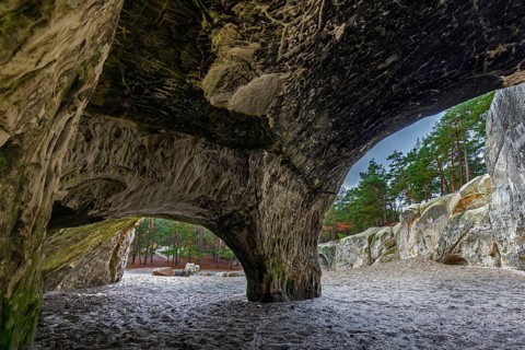 Engravings in the Sandhoehlen, sandstone caves in forest called Im Heers below the crags of