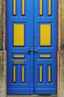 Typical colourful front door in Alfama, yellow, blue, lacquer, varnished, door, entrance,