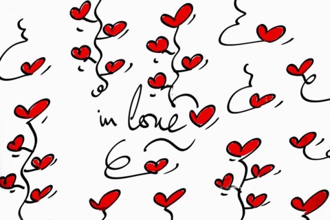 Street art, painted house wall with hearts and lettering on the theme of love, Montmartre, Paris,