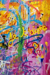 Street art, painted house wall with hearts and lettering on the theme of love, Montmartre, Paris,
