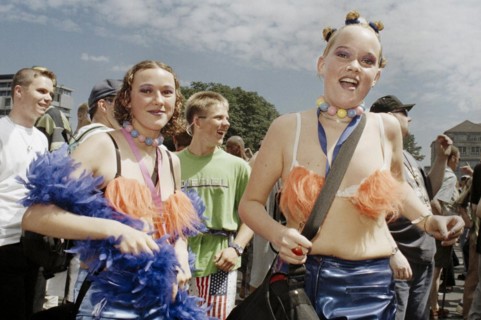 Techno fans celebrate during the Love Parade. Under the motto Let the sun shine to your heart,