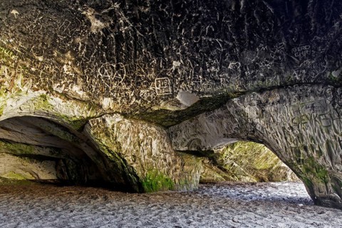 Engravings in the Sandhoehlen, sandstone caves in forest called Im Heers below the crags of