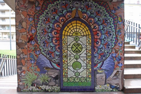 Staircase with wall mosaic flora and fauna by Isidora Paz Lopez 2019, rosette, circle, colourful,