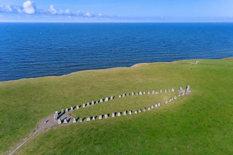 Aerial view over Ale's Stones, Ales stenar, megalithic stone oval monument representing stone ship