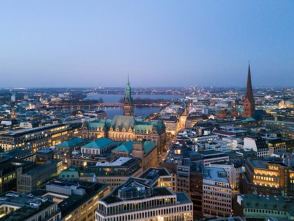 Aerial view of Hamburg City Hall with Inner Alster and Outer Alster Lake at blue hour, Hamburg,