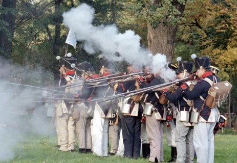 Actors in historical uniforms re-enact the battle in historical battle scenes on the 185th