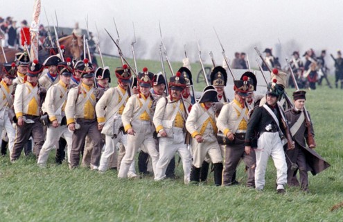 Actors in historical uniforms re-enact the battle in historical battle scenes on the 185th
