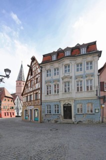 Building built in the 18th century at the wine market and church tower of St Maria am See church,