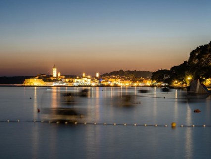 Night shot, illuminated church towers, old town centre of Rab, town of Rab, island of Rab, Kvarner
