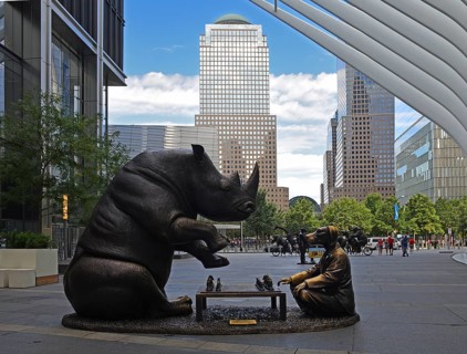 Bronze artwork for endangered animals, rhino and dog playing chess, exhibition A Wild Life for