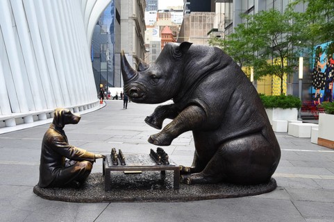 Bronze artwork for endangered animals, rhino and dog playing chess, exhibition A Wild Life for