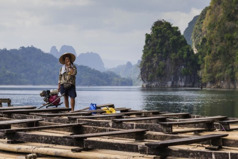 Woman on a raft in Cheow Lan Lake in Khao Sok National Park, limestone rock, woman, Asian, Asian,