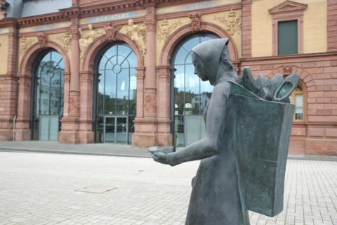 Sculpture shoe carrier and monument to former shoe industry in front of the old post office built