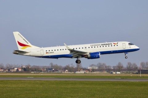 German Airways Embraer E190SR with registration D-AKJC lands on the Polderbaan, Amsterdam Schiphol
