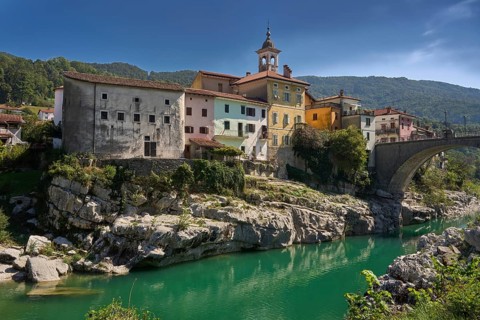 Canal ob Soci, picturesque village on the Soca river, trough gorge, on the right the canal bridge