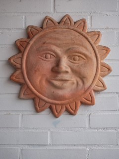 Terracotta sun for garden and house decoration, North Rhine-Westphalia, Germany, Europe