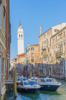 Police Station with Police Motorboat on Water Canal in a Sunny Day in City of Venice, Veneto,
