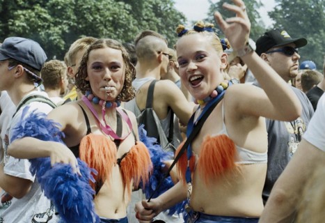 Techno fans celebrate during the Love Parade. Under the motto Let the sun shine to your heart,