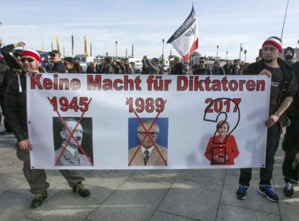 Participants in the Merkel must go demo. Demonstration by right-wing populist and right-wing