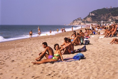 Sunbathers on the beach in Calella, Costa Brava, Barselona, Catalonia, Spain, Southern Europe.