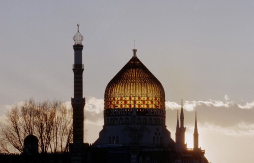 Sunset behind the silhouette of the former Yenidze cigarette factory in Dresden, 11 March 1998. The