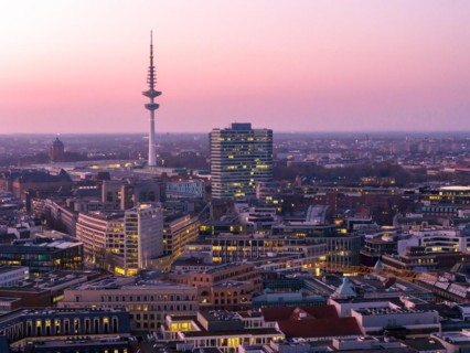 Aerial view at blue hour Heinrich Hertz television tower with exhibition centre, Hamburg, Germany,