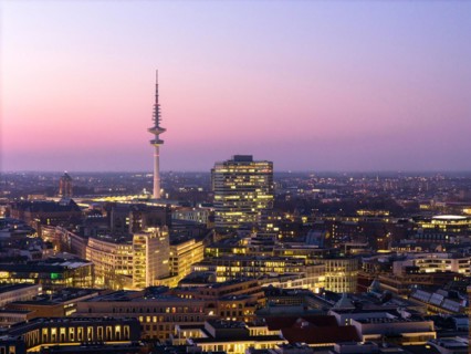 Aerial view at blue hour Heinrich Hertz television tower with exhibition centre, Hamburg, Germany,