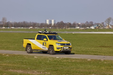Bird Control Vehicle K1 patrolling the Polderbaan, Amsterdam Schiphol Airport in Vijfhuizen,