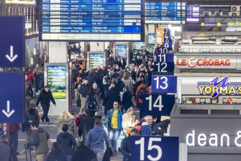 Central station, travellers in the platform hall. Extensive construction work on the railway
