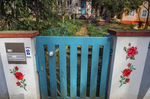 Cyan-coloured garden gate of an old villa, Kempten, Allgaeu, Bavaria, Germany, Europe