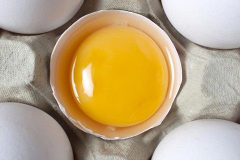 Eggs and egg yolks in an egg carton, 14/03/2015