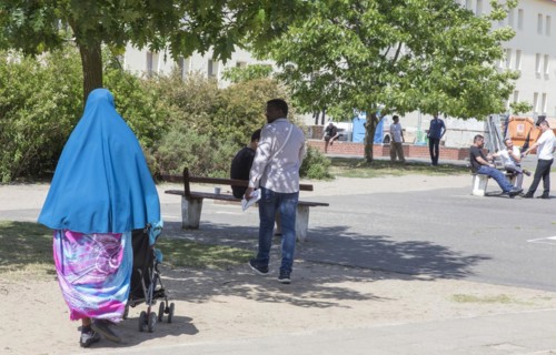 Refugees at the central contact point for asylum seekers in Brandenburg, Eisenhuettenstadt, 3 June