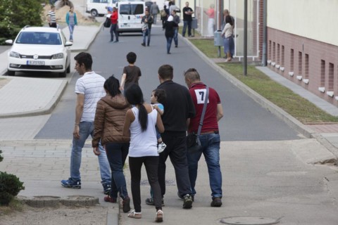 Refugees at the central contact point for asylum seekers in the state of Brandenburg in