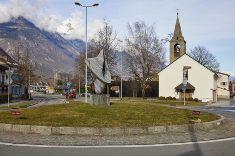 Bell tower with church Clocher de la chapelle St. Michel, art in the roundabout by Antoine Poncet