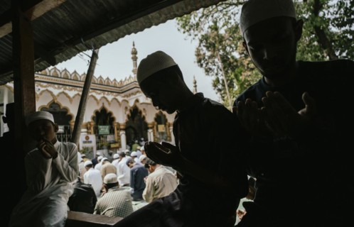 Muslim devotees offer the first Friday prayers of the holy month of Ramadan at a Mosque, on March
