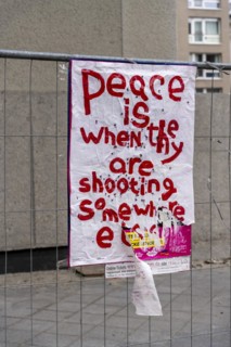 Symbolic photo, poster on a construction fence, Berlin, Germany, Europe