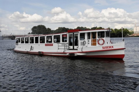 A small excursion boat sailing on the Alster, Hamburg, Hanseatic City of Hamburg, Germany, Europe