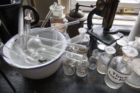 Glass jars for the production of medicines stand in the former laboratory in the historic Berg