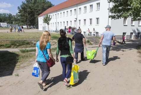 Refugees at the central contact point for asylum seekers in Brandenburg, Eisenhuettenstadt, 3 June