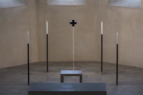 4 candles and a glass cross at the former altar site, St Clare's Church, Koenigstrasse 66,