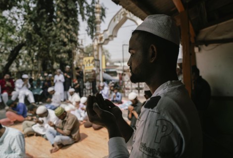 Muslim devotees offer the first Friday prayers of the holy month of Ramadan at a Mosque, on March