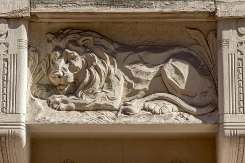 Ornamental console with lion, relief in console under bay window, town house in Art Nouveau style,