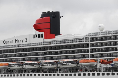Partial view of a cruise ship Queen Mary 2, with selective colour display and lifeboats, Hamburg,