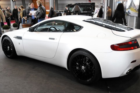 RETRO CLASSICS 2010, Stuttgart Messe, Side view of a white Aston Martin sports car at a trade fair,