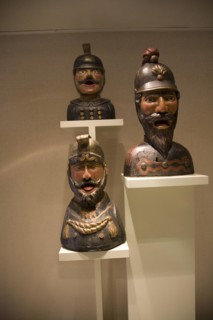 Display of old open mouthed gaper heads traditionally used to identify a pharmacy in Holland,