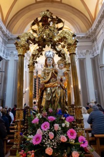 Madonna Santa Maria Statue and People Praying Inside the Church of San Nazzaro (Croglio) in