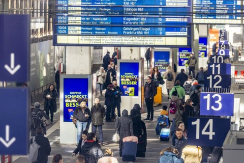 Central station, travellers in the platform hall. Extensive construction work on the railway