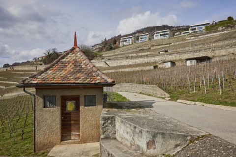 Historic small house with a square floor plan and red roof in the UNESCO World Heritage Site of the